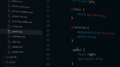 Close-up of colorful CSS code lines on a computer screen for web development.